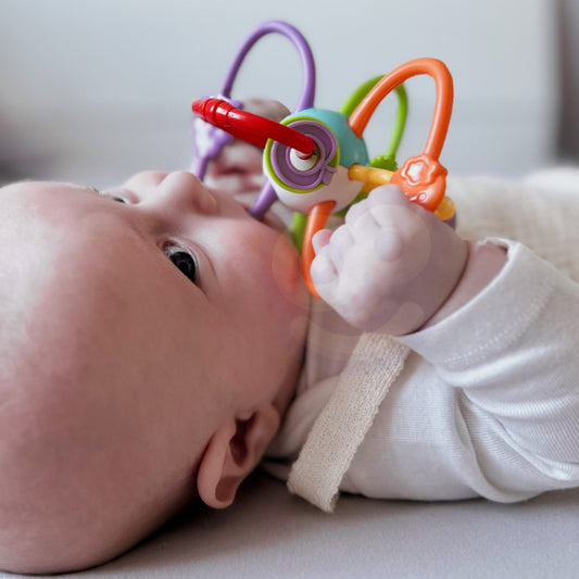 WOOPIE BABY sensorische bijtring en rammelaar 2 in 1