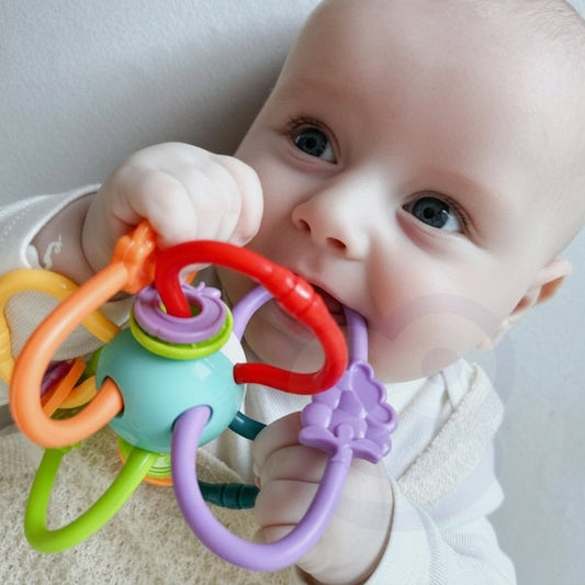 WOOPIE BABY sensorische bijtring en rammelaar 2 in 1